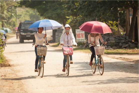 Schoolgirls with umbrella