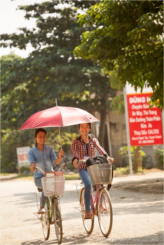 Schoolgirls with umbrella